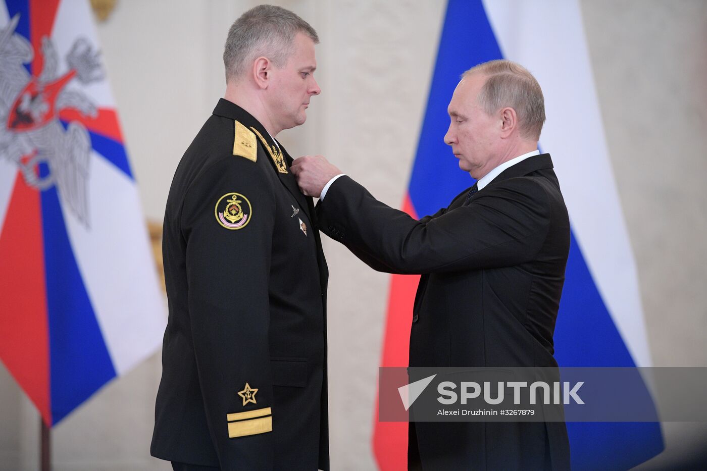 Russian President Vladimir Putin meets with service personnel who took part in counter-terrorism operation in Syria