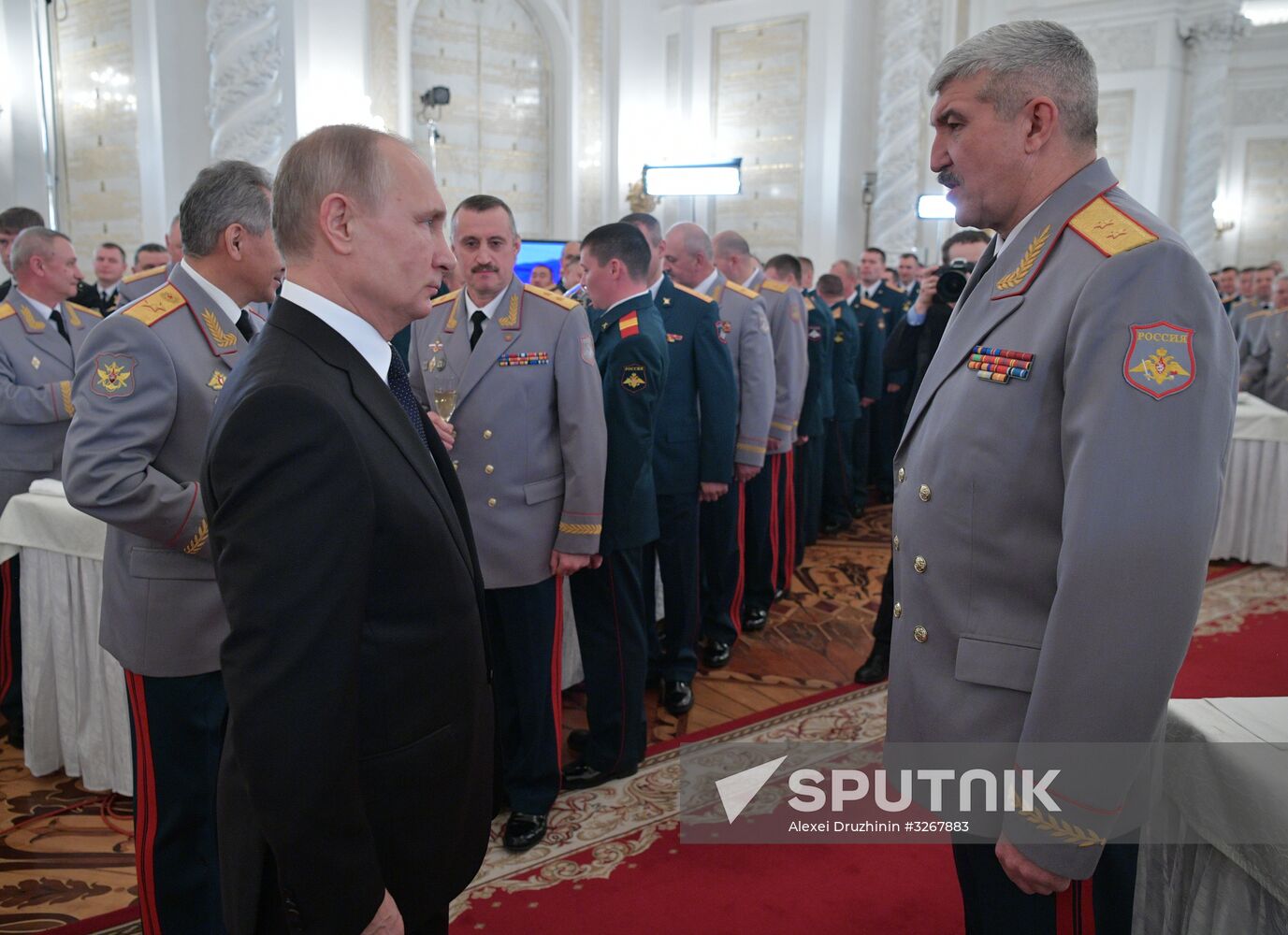 Russian President Vladimir Putin meets with service personnel who took part in counter-terrorism operation in Syria