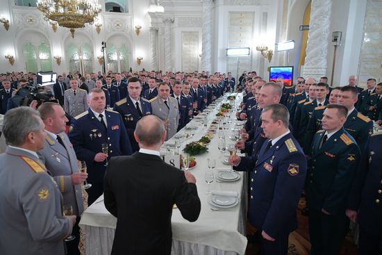 Russian President Vladimir Putin meets with service personnel who took part in counter-terrorism operation in Syria