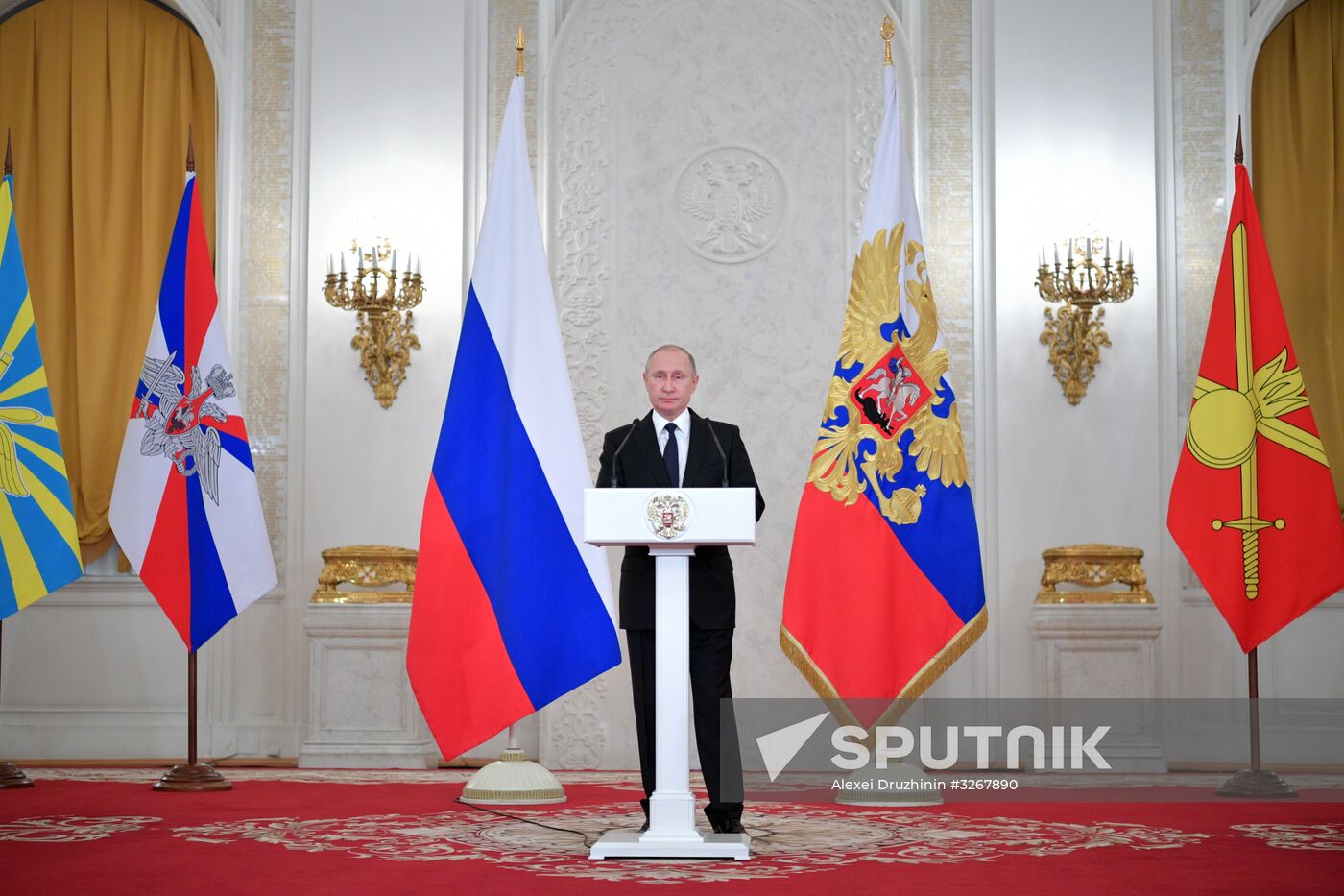 Russian President Vladimir Putin meets with service personnel who took part in counter-terrorism operation in Syria