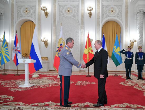 Russian President Vladimir Putin meets with service personnel who took part in counter-terrorism operation in Syria