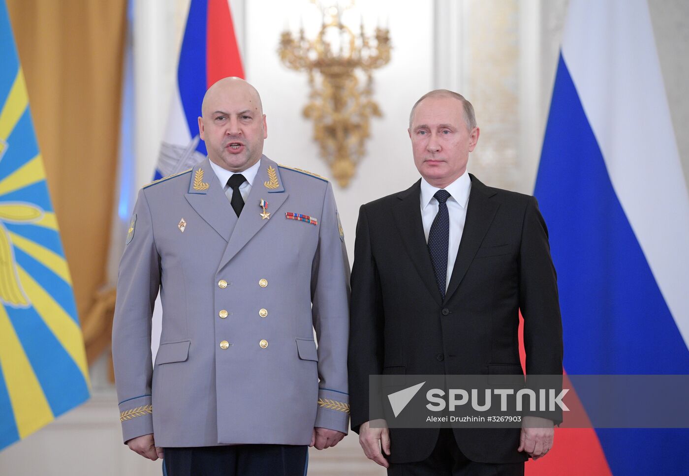 Russian President Vladimir Putin meets with service personnel who took part in counter-terrorism operation in Syria