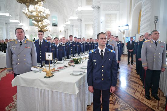 Russian President Vladimir Putin meets with service personnel who took part in counter-terrorism operation in Syria