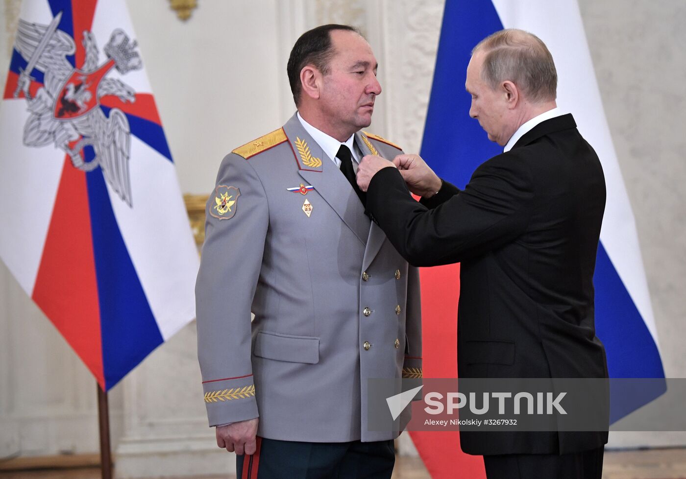 Russian President Vladimir Putin meets with service personnel who took part in counter-terrorism operation in Syria