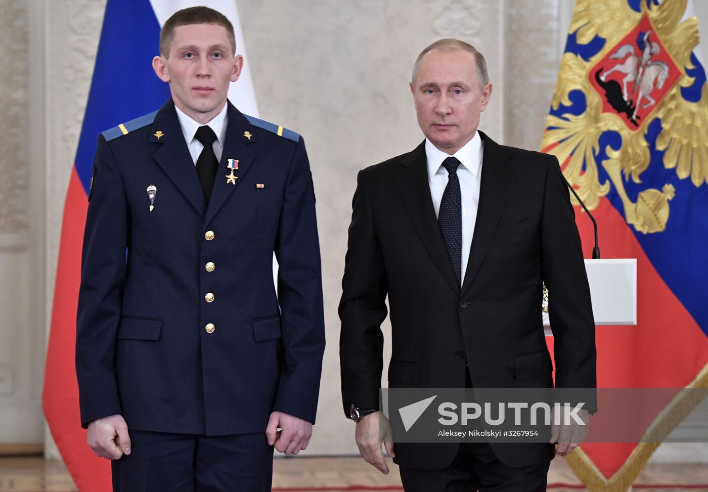 Russian President Vladimir Putin meets with service personnel who took part in counter-terrorism operation in Syria