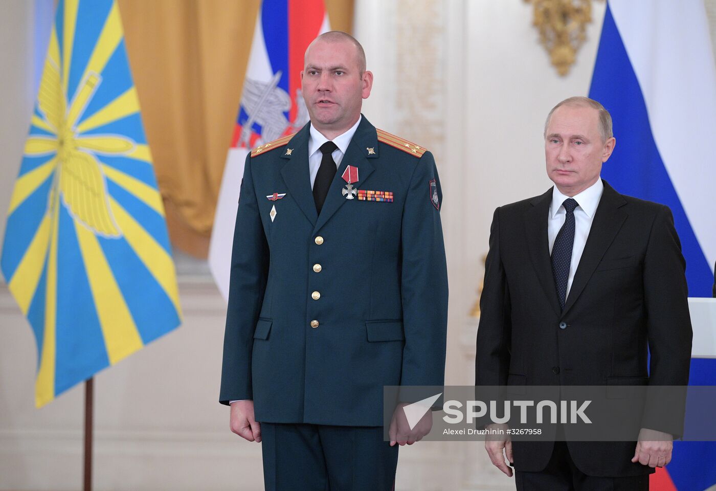 Russian President Vladimir Putin meets with service personnel who took part in counter-terrorism operation in Syria