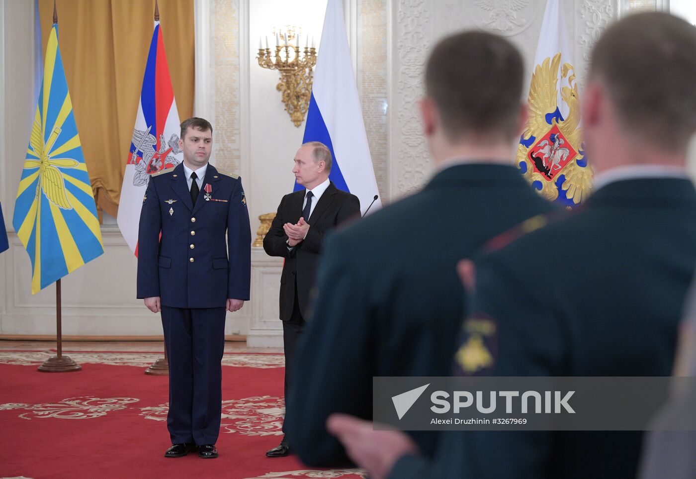 Russian President Vladimir Putin meets with service personnel who took part in counter-terrorism operation in Syria