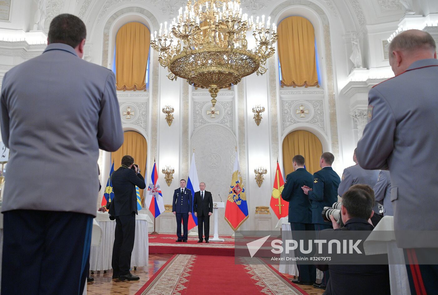 Russian President Vladimir Putin meets with service personnel who took part in counter-terrorism operation in Syria