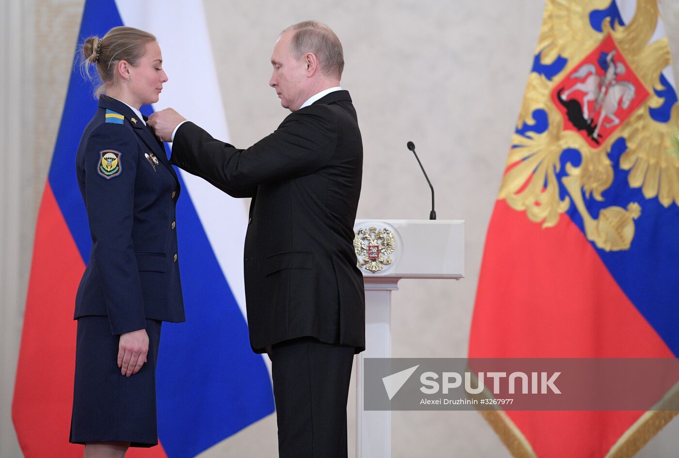 Russian President Vladimir Putin meets with service personnel who took part in counter-terrorism operation in Syria