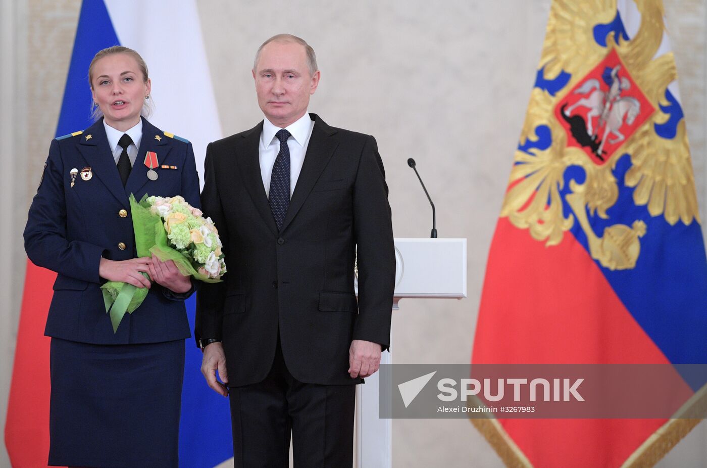 Russian President Vladimir Putin meets with service personnel who took part in counter-terrorism operation in Syria