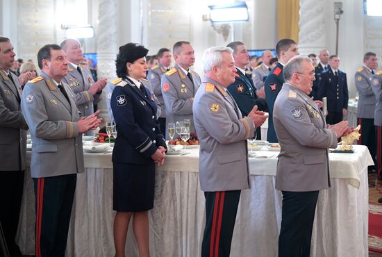 Russian President Vladimir Putin meets with service personnel who took part in counter-terrorism operation in Syria