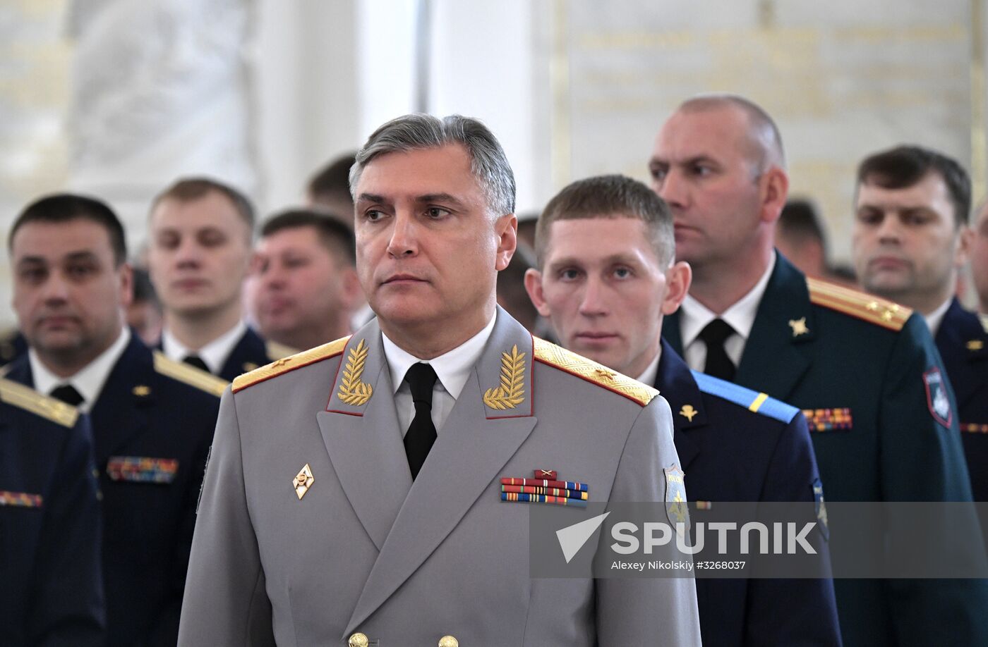 Russian President Vladimir Putin meets with service personnel who took part in counter-terrorism operation in Syria