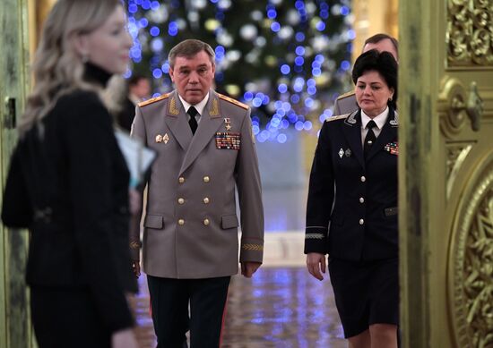 Russian President Vladimir Putin meets with service personnel who took part in counter-terrorism operation in Syria