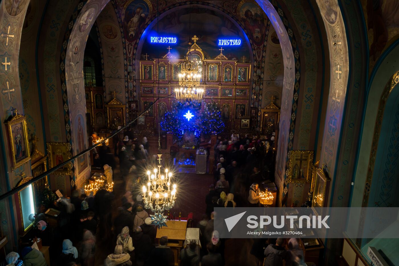 Parishioners attend a Christmas mass in the Peter and Paul Cathedral, Simferopol. Location: Russia, Republic of Crimea, Simferopol. Author: Alexey Malgavko/Sputnik. Christmas celebrated across Russia