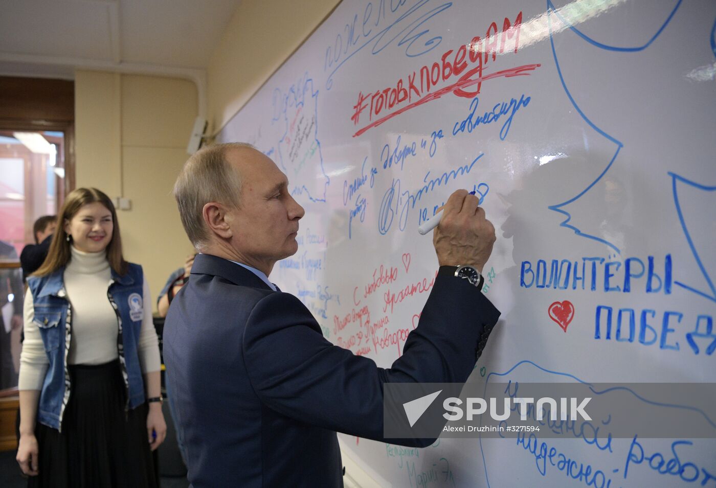 President Vladimir Putin visits his campaign headquarters in Moscow