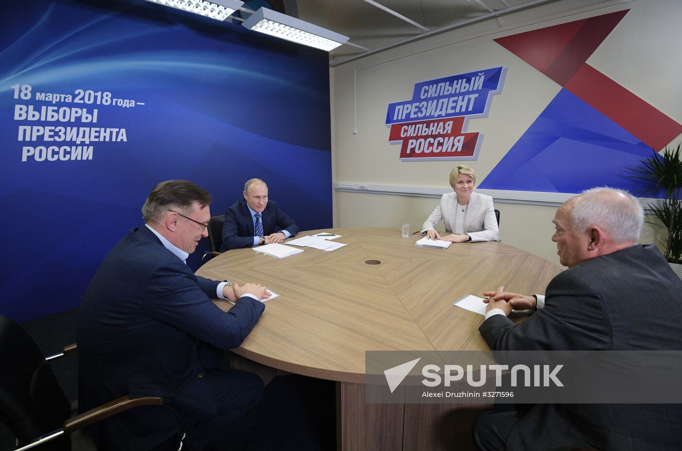 President Vladimir Putin visits his campaign headquarters in Moscow