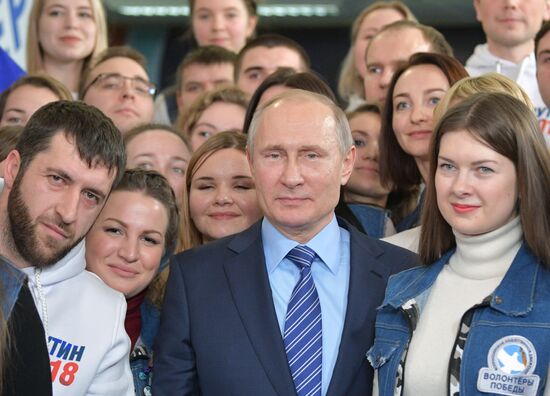 President Vladimir Putin visits his campaign headquarters in Moscow