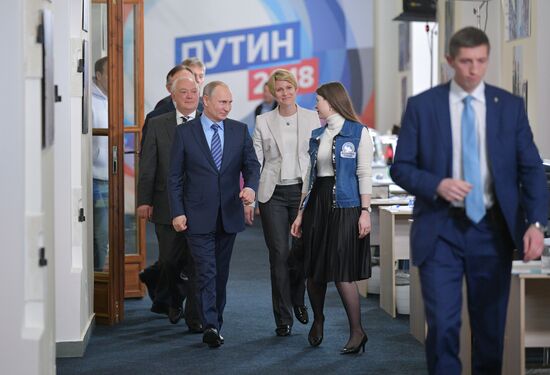President Vladimir Putin visits his campaign headquarters in Moscow