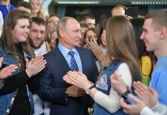 President Vladimir Putin visits his campaign headquarters in Moscow
