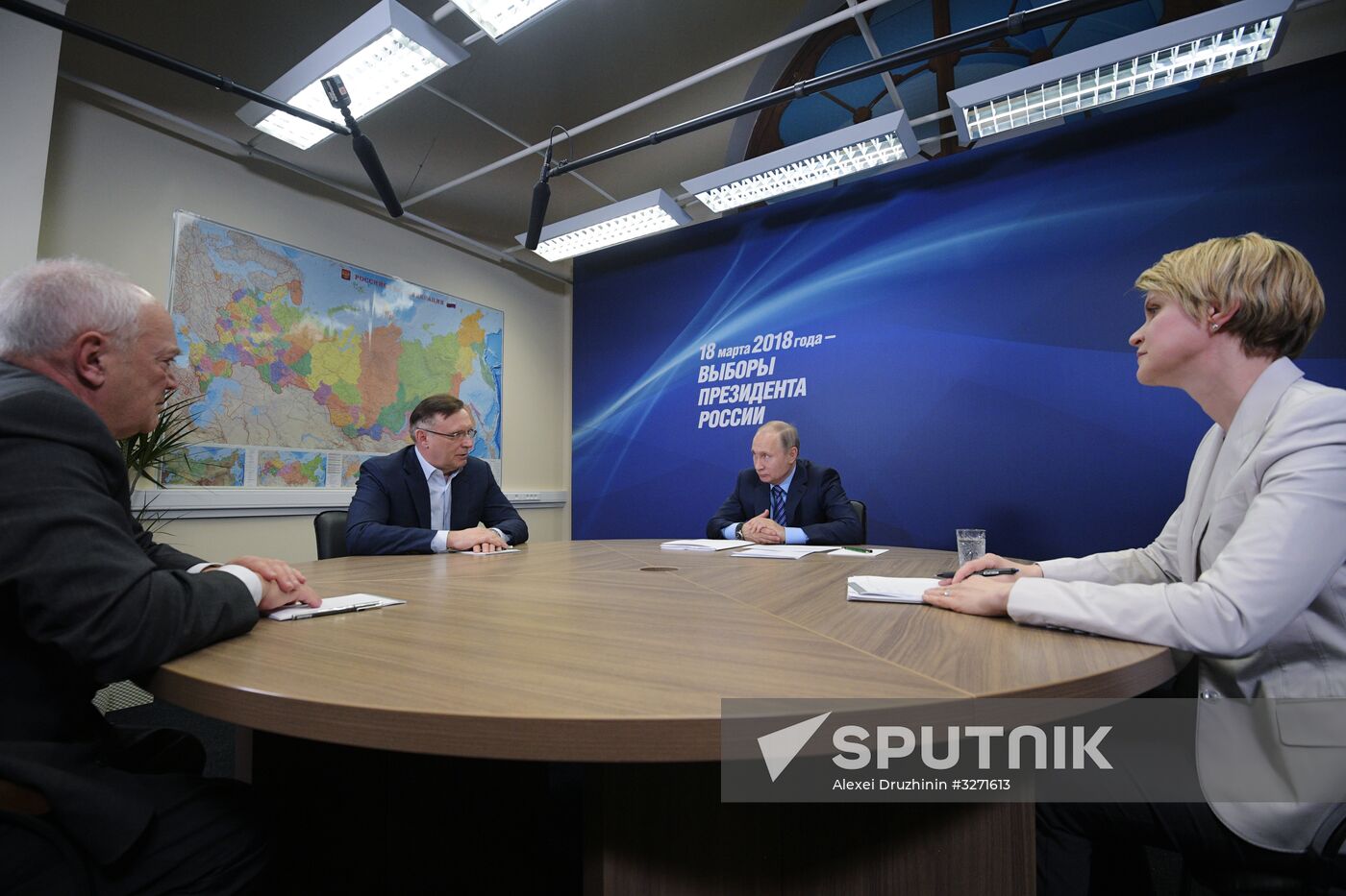 President Vladimir Putin visits his campaign headquarters in Moscow