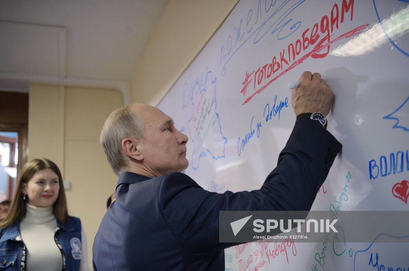 President Vladimir Putin visits his campaign headquarters in Moscow