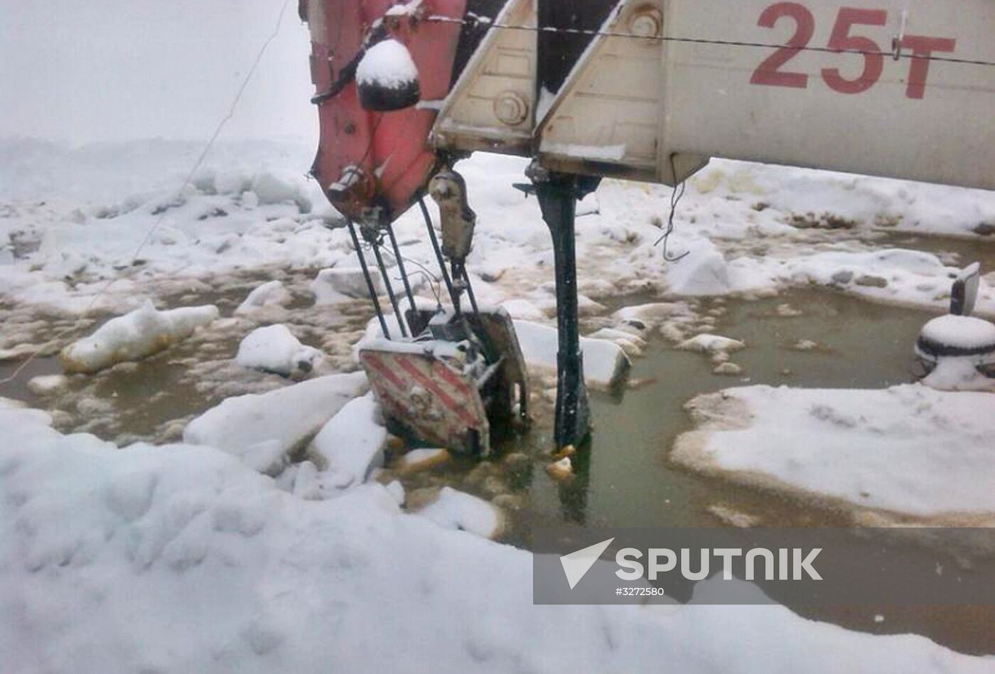 Gas tank truck with 20 tonnes of fuel falls through ice on Lena river