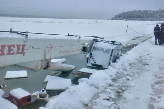 Gas tank truck with 20 tonnes of fuel falls through ice on Lena river