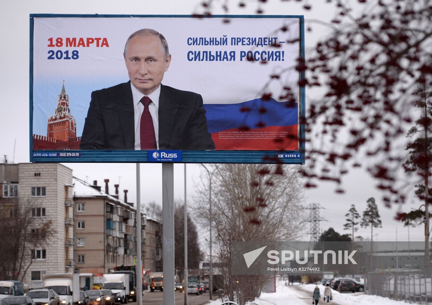 Campaign posters in support of incumbent Russian President Vladimir Putin