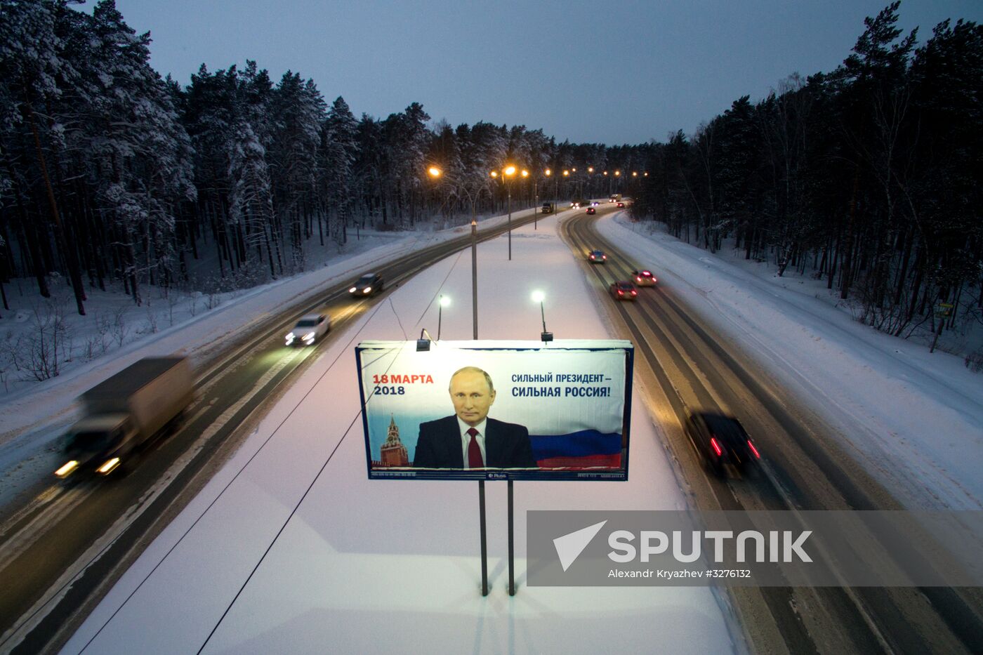 Campaign posters in support of incumbent Russian President Vladimir Putin