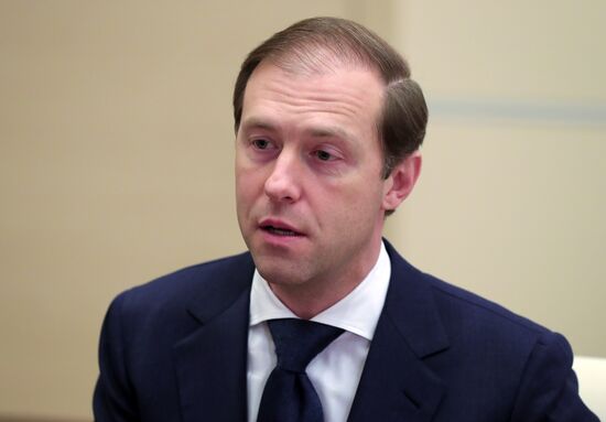 President Putin meets with Minister of Industry and Trade Denis Manturov