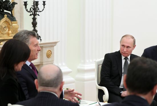 President Vladimir Putin meets with Argentinian President Mauricio Macri