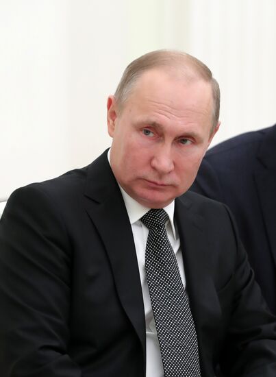 President Vladimir Putin meets with Argentinian President Mauricio Macri