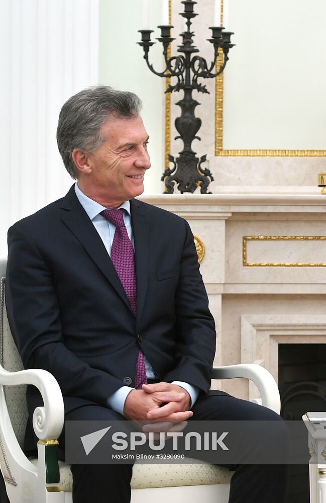 President Vladimir Putin meets with Argentinian President Mauricio Macri
