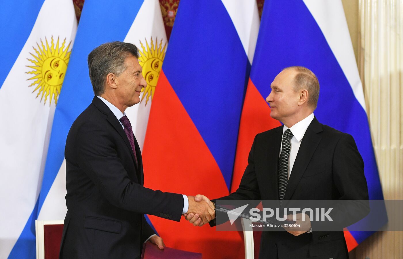 President Vladimir Putin meets with Argentinian President Mauricio Macri