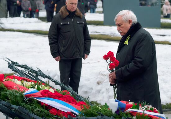 Wreaths and flowers laid at Piskaryovskoye Memorial Cemetery
