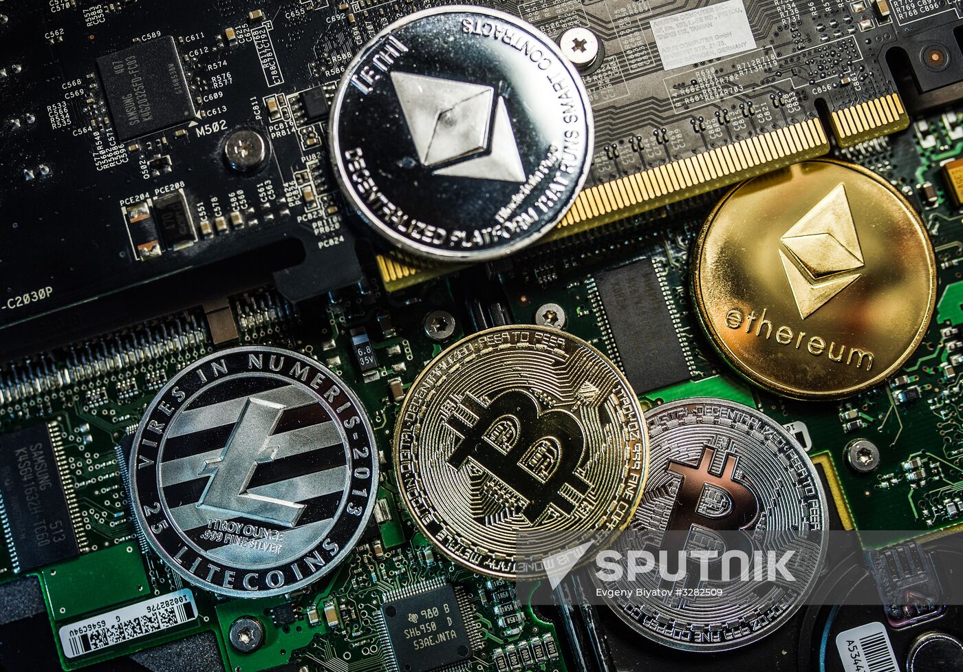 Souvenir coins with cryptocurrency logos
