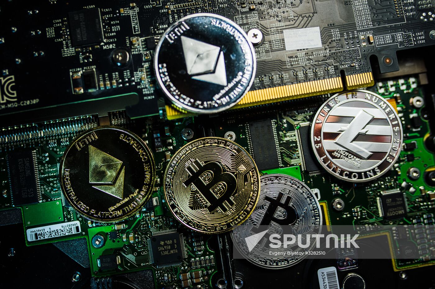 Souvenir coins with cryptocurrency logos