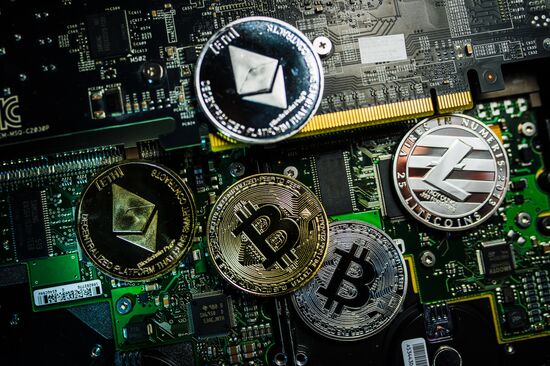 Souvenir coins with cryptocurrency logos