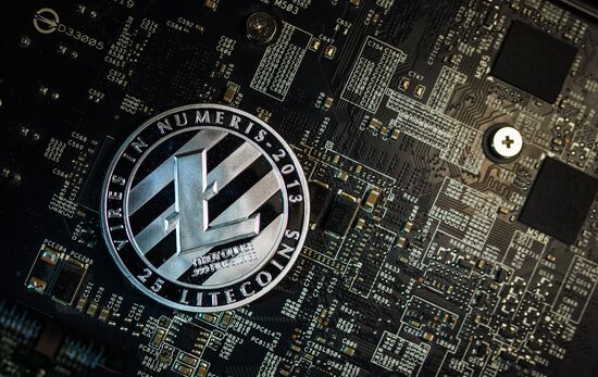 Souvenir coins with cryptocurrency logos