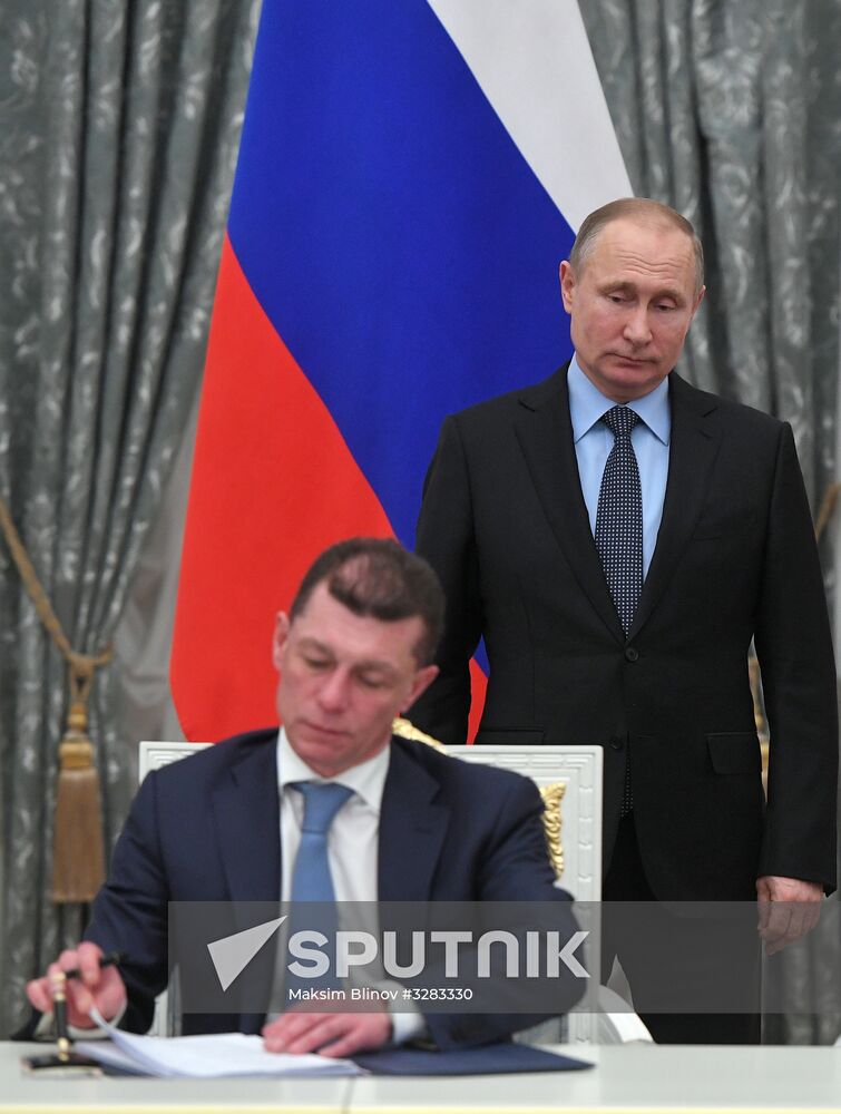 President Vladimir Putin at ceremony to sign agreement between Russian trade unions, employers and Russian Government