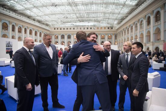 Russian presidential candidate Vladimir Putin meets with his authorized representatives