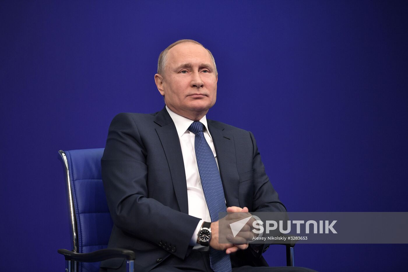 Russian presidential candidate Vladimir Putin meets with his authorized representatives