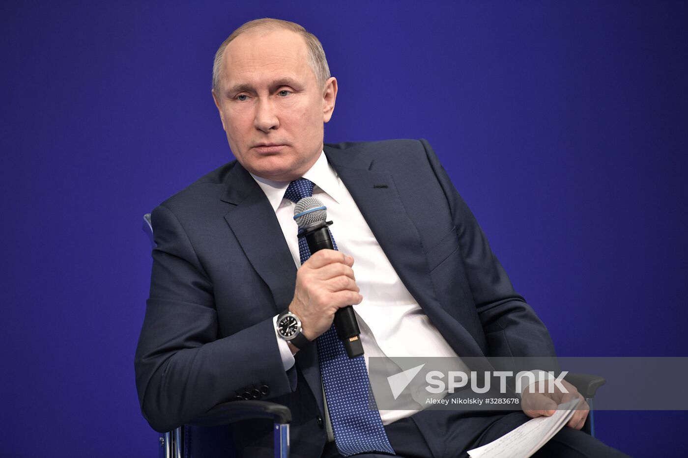 Russian presidential candidate Vladimir Putin meets with his authorized representatives