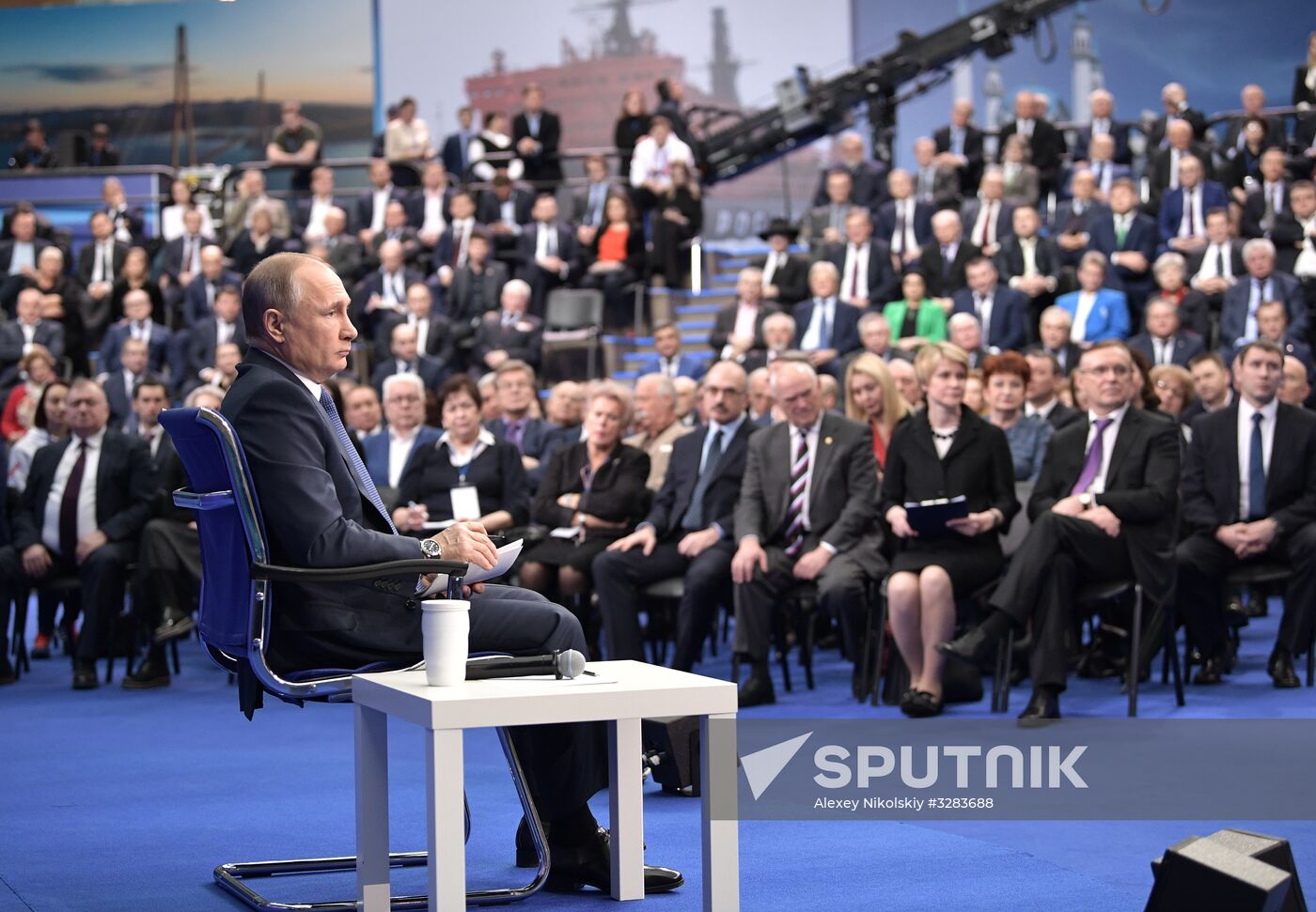 Russian presidential candidate Vladimir Putin meets with his authorized representatives