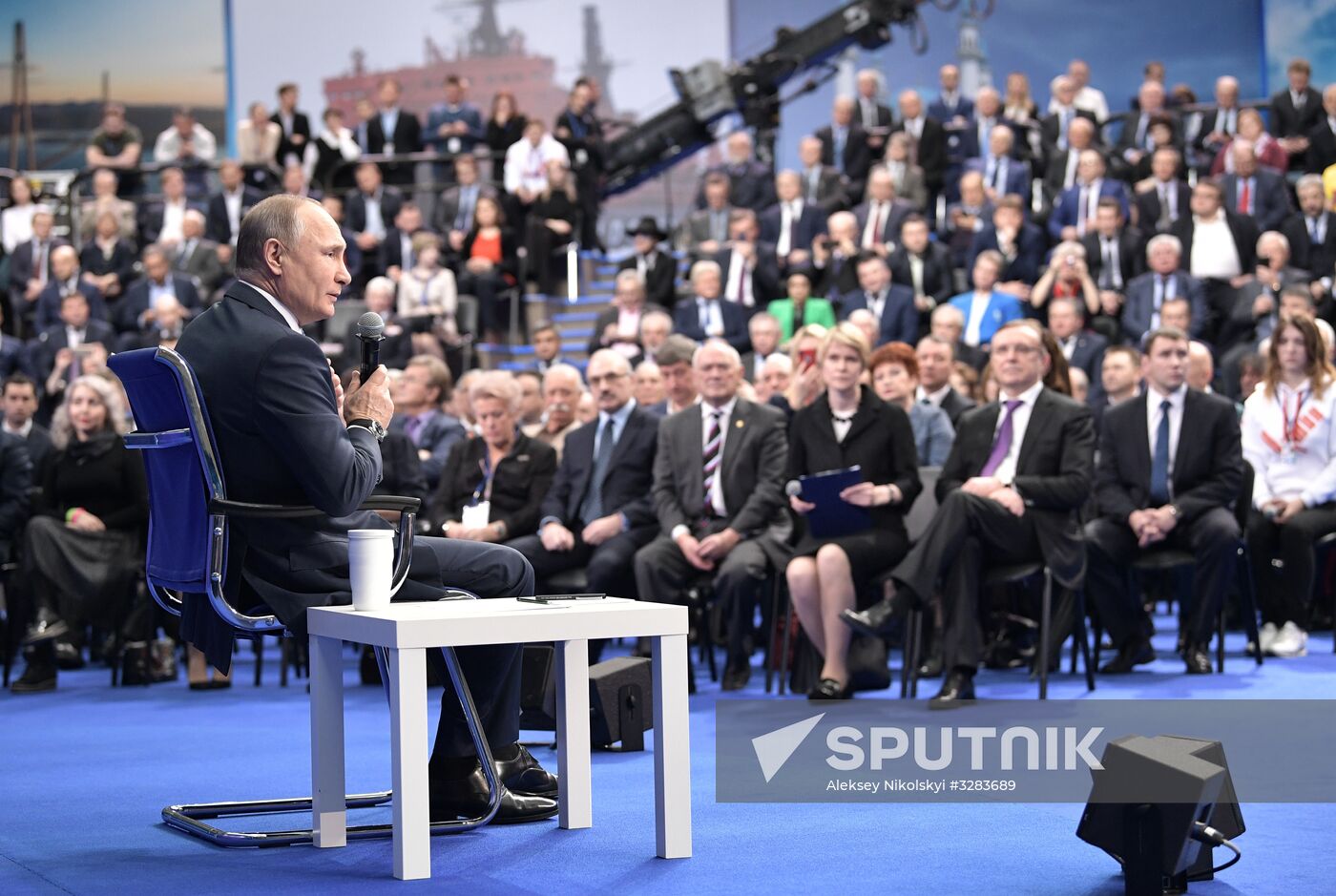 Russian presidential candidate Vladimir Putin meets with his authorized representatives
