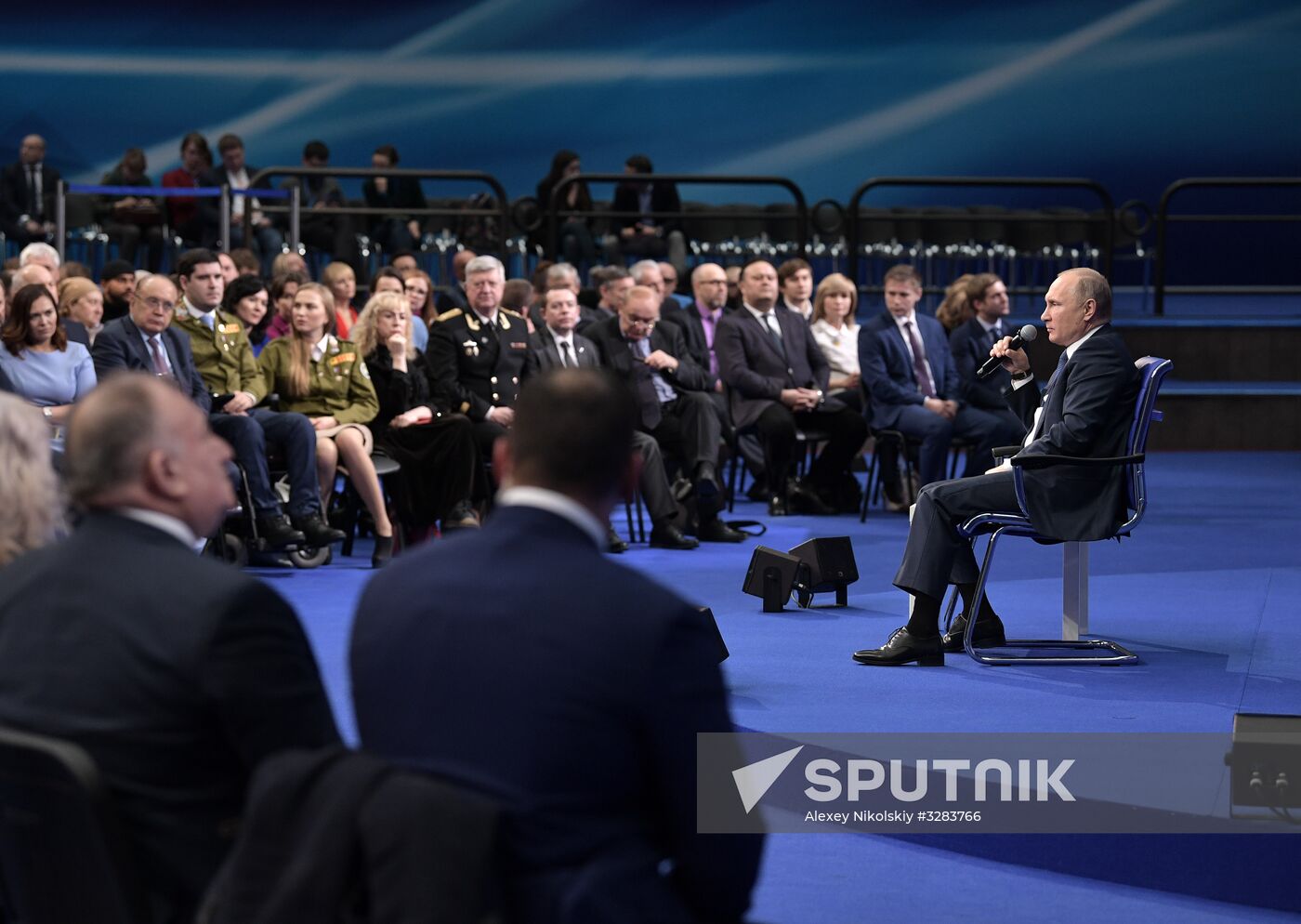 Russian presidential candidate Vladimir Putin meets with his authorized representatives