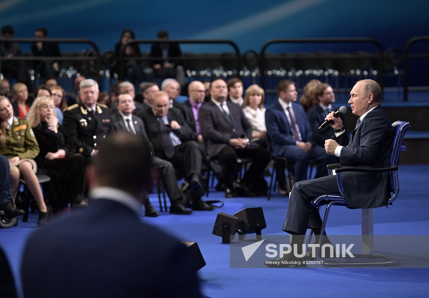 Russian presidential candidate Vladimir Putin meets with his authorized representatives