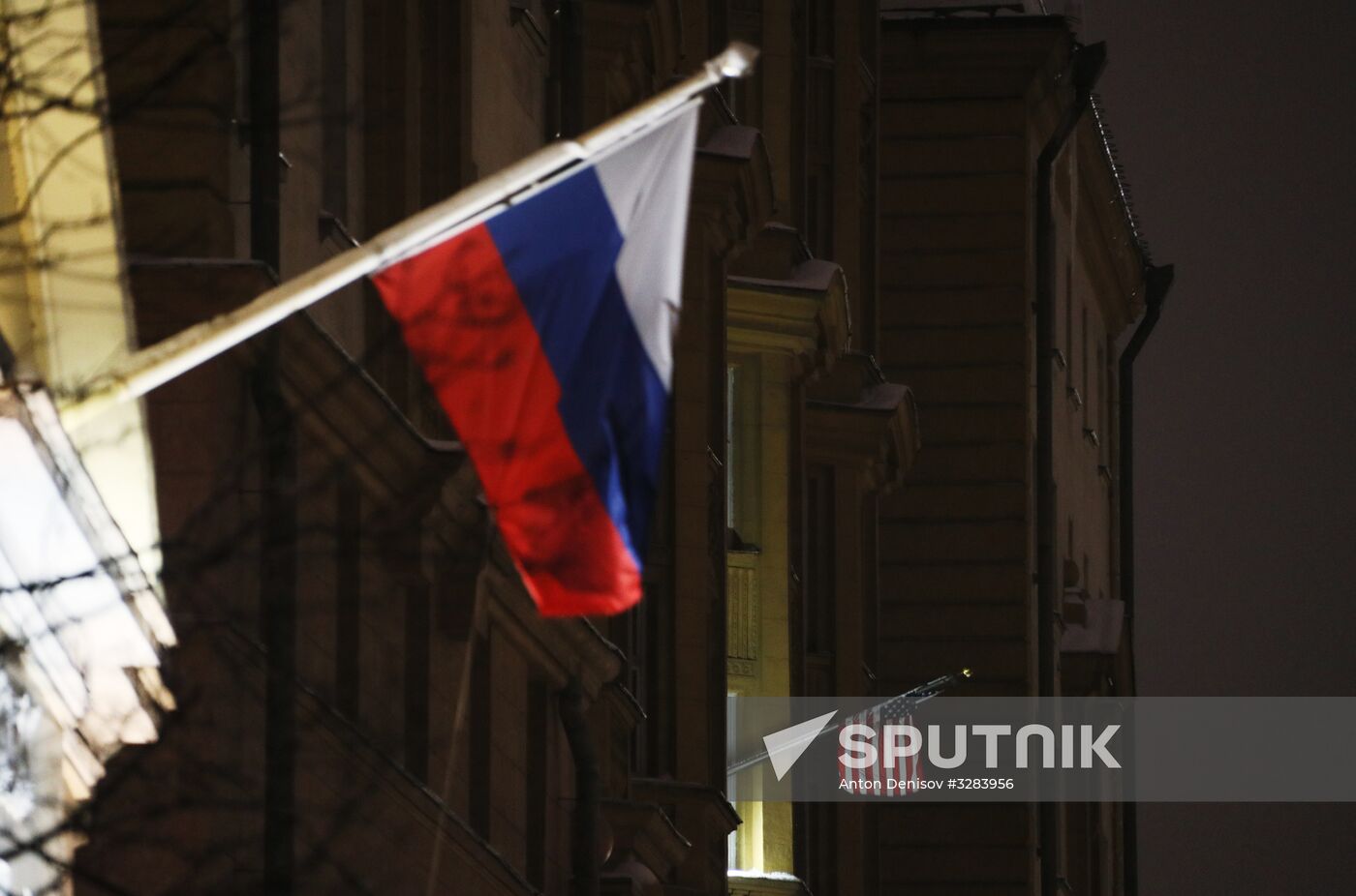 US and Russian flags on US Embassy building