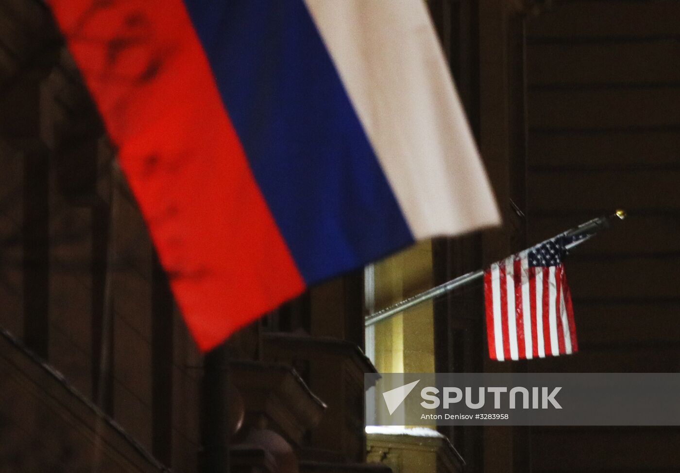 US and Russian flags on US Embassy building