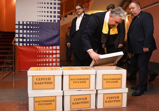 Submitting signatures in support of Sergei Baburin's registration as presidential candidate